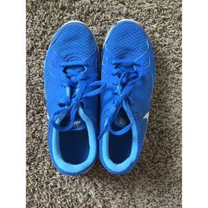 Blue Nike women’s running shoes, size 7.5.